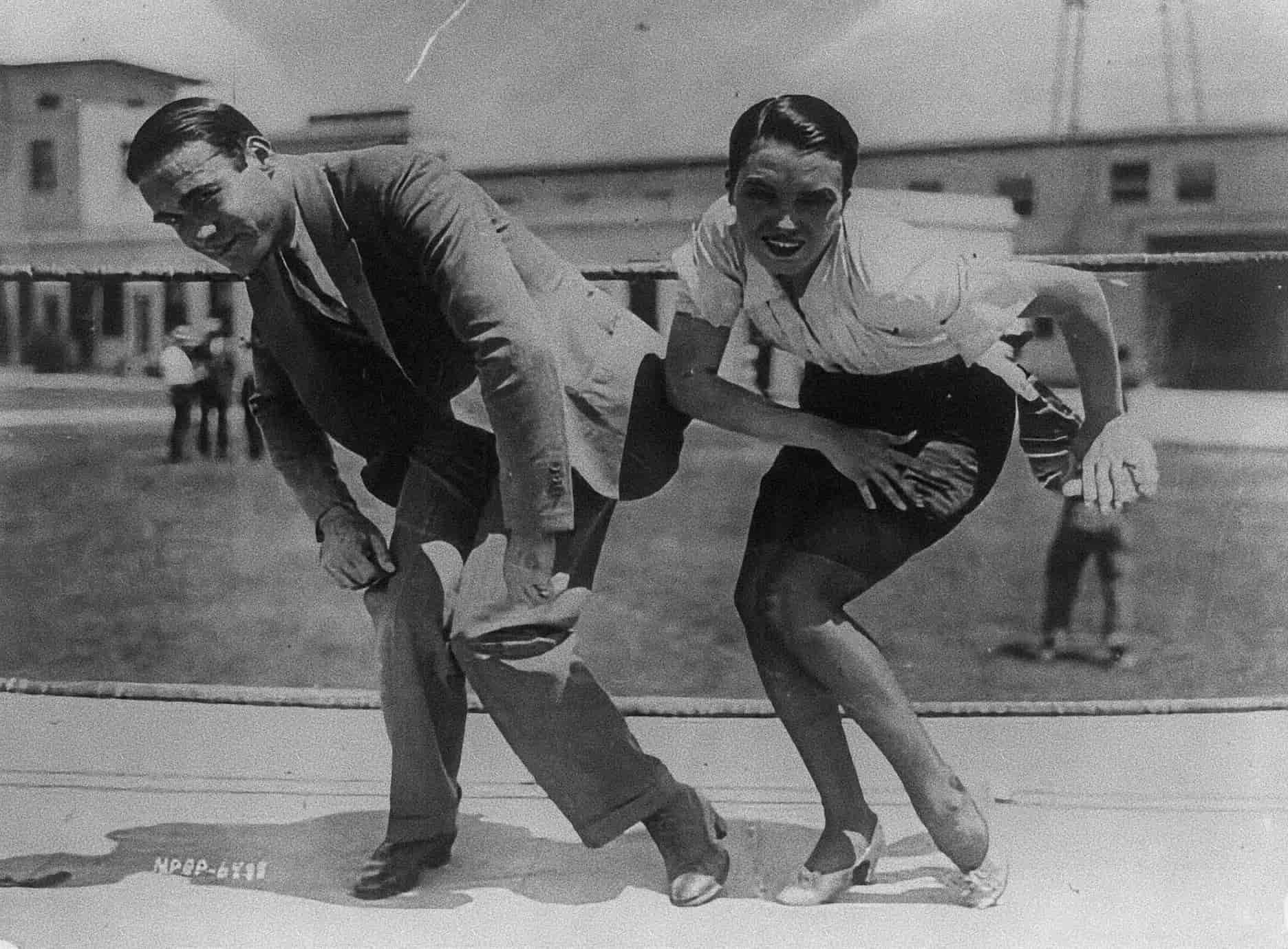 The Charleston, named after Charleston, South Carolina, swept through the 1920s with quick steps and swinging arms, carrying jazz into wider life. © Public Domain