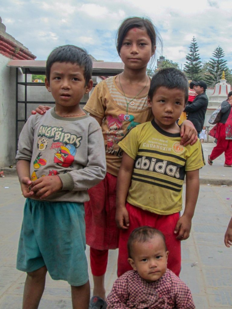 This is a photo of four children living in Kthmandu.