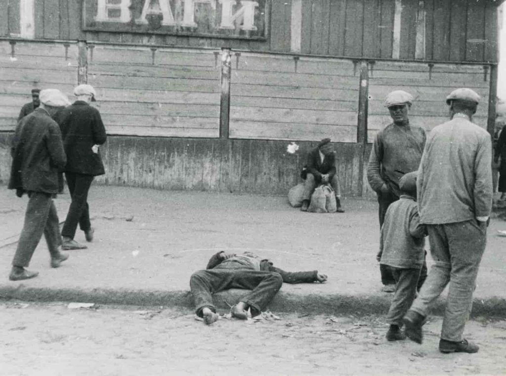 man lying on the floor Holodomor 1932 to 1933