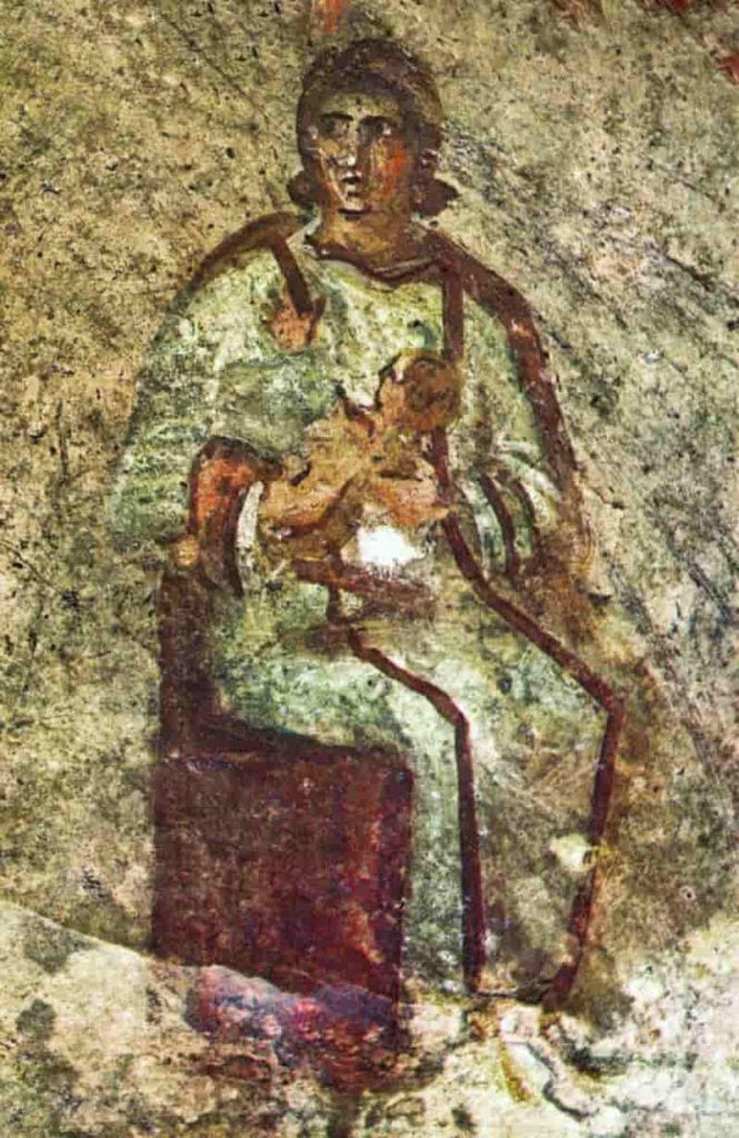 Mary holding Jesus in Catacombs of Santa Priscilla