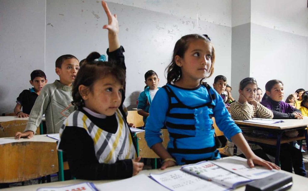 Syrian refugee children in a Lebanese school classroom