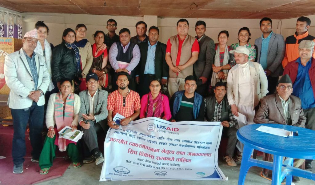 Sunil Kumar Pariyar, standing in the middle with Dalit and marginalised community members of Tila Watersheds, after a campaign in Jumla Kalikot.