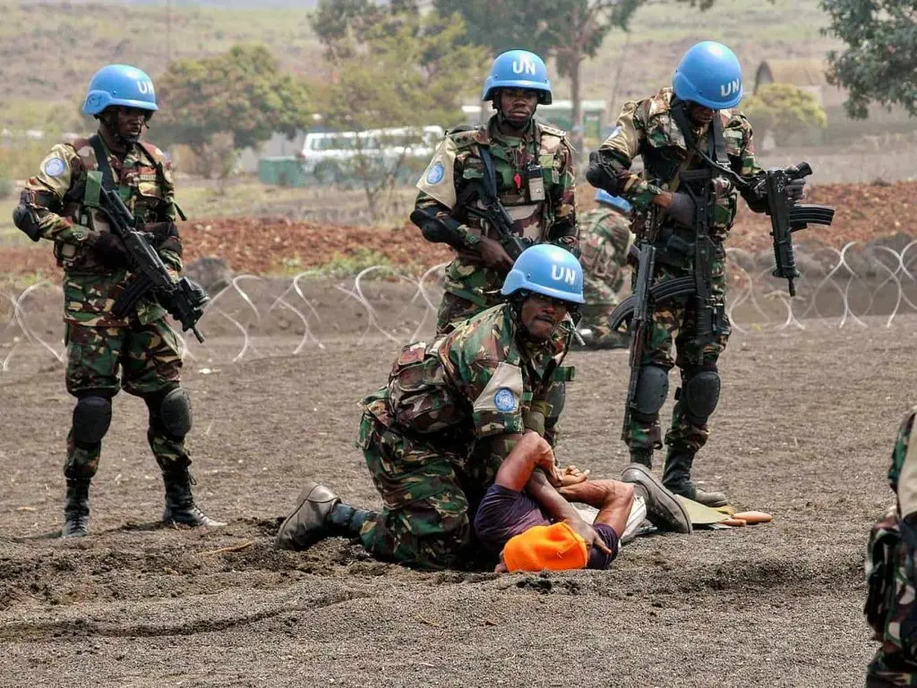 UN peacekeeping troops with arms. 