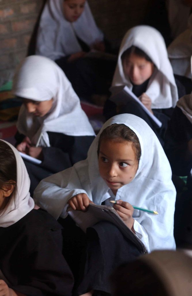 Young Afghan girls studying