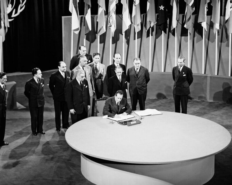 Ezequiel Padilla, Mexico's Secretary of Foreign Affairs, signs the UN Charter on 26 June 1945 at the Veterans' War Memorial Building. This followed the San Francisco Conference where fifty nations unanimously agreed on the Charter, which took effect on 24 October 1945.