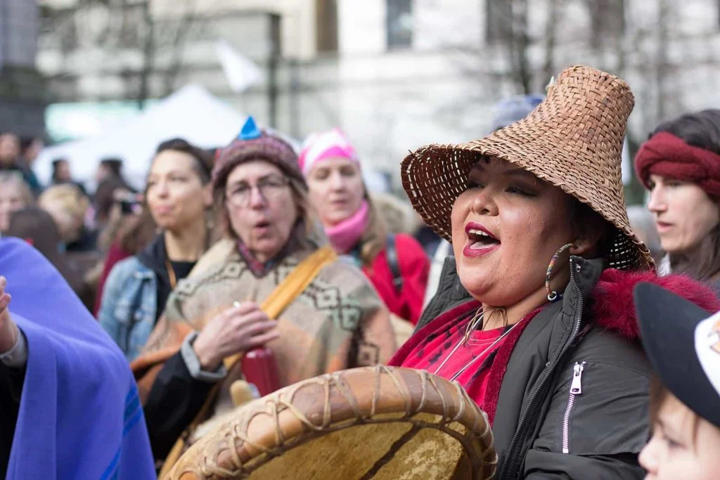Nation-Building and Indigenous Struggles: Histories, Rights and Representation 4 1599px First Nations Protesters Drumming at Vancouver Womens March January 19 2018 46084944244