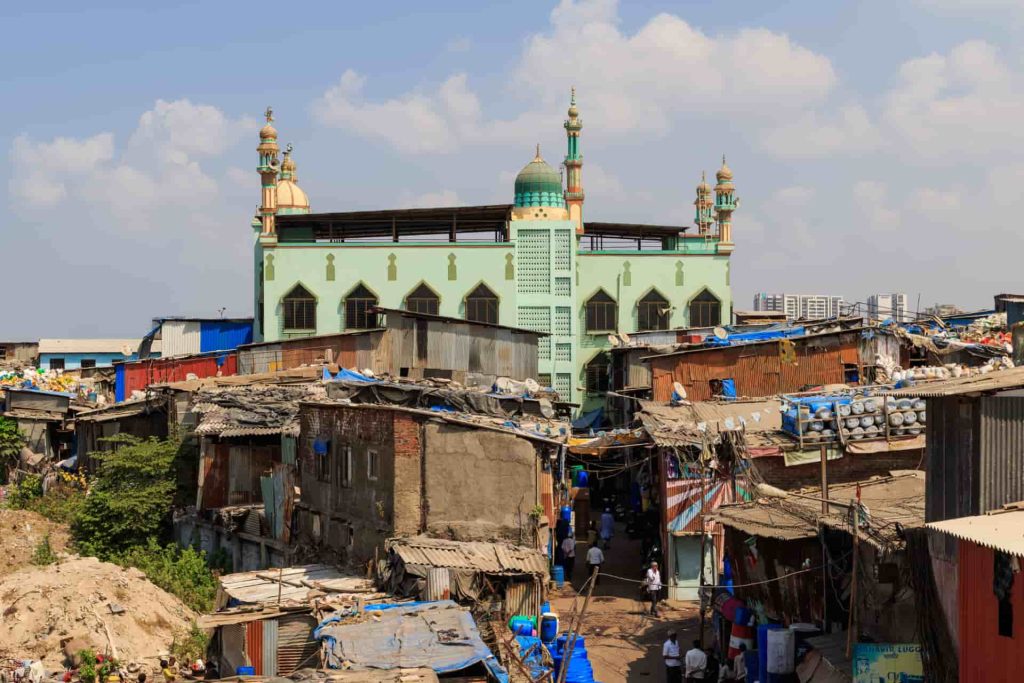Dharavi, one of Asia's largest slums, sprawls near Mahim Junction in Mumbai, India, housing a dense network of shanty homes. Photo: A. Savin © FAL