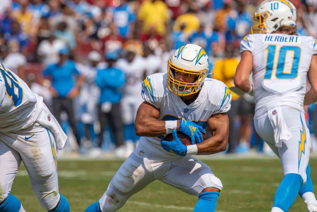 From GQ Sports' "My First Million" series, Austin Ekeler advises NFL rookies: "Plan from day one with a financial advisor, as careers in sports are short and uncertain." Photo: All-Pro Reels/Flickr © CC BY-SA 2.0